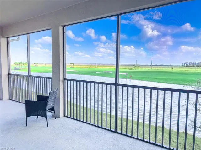 a view of a park with a palm trees