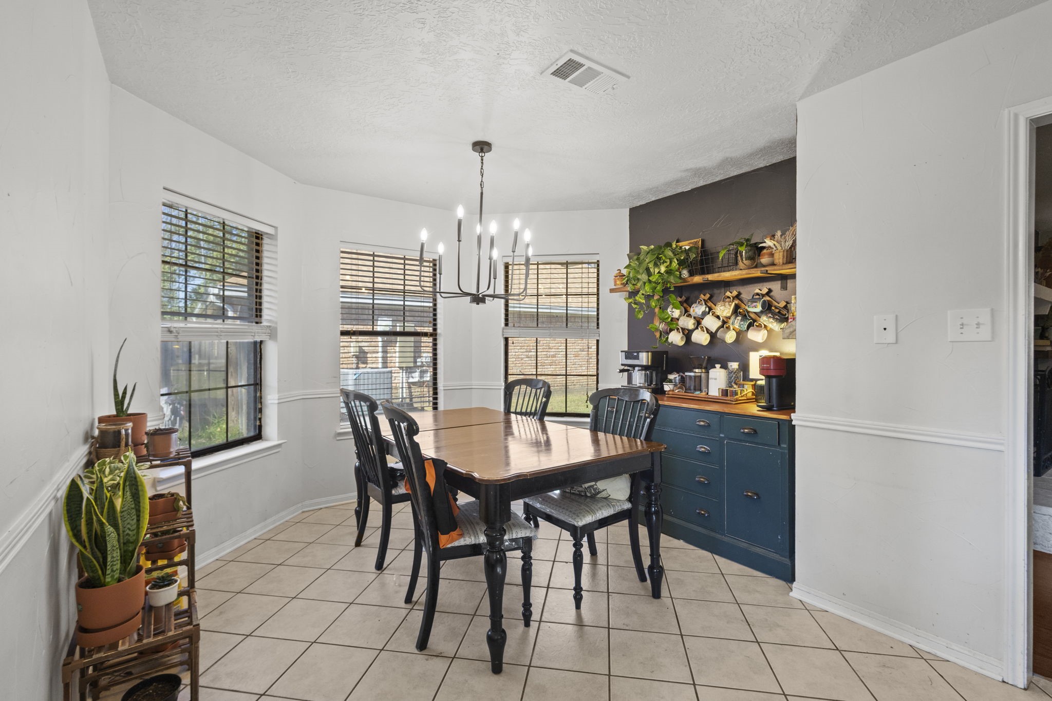 125 Williams Road Lumberton, TX 77657 - Photo 11 of 22 a view of a dining room with furniture and chandelier
