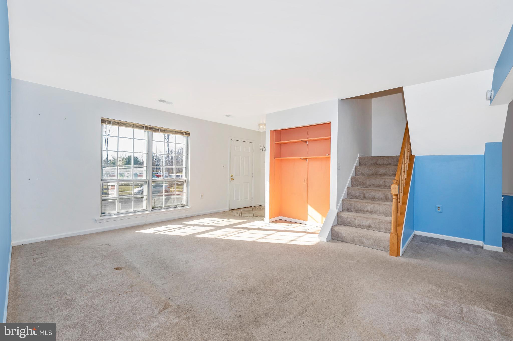 432 Terry Court, Unit B4 Frederick, MD 21701 - Photo 4 of 19 Living room with stairway to upstairs