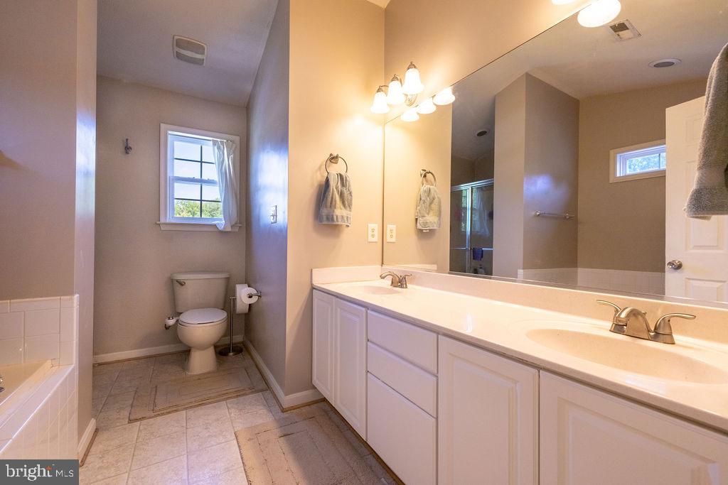 8896 Mullen Road King George, VA 22485 - Photo 20 of 48 Bright and airy bathroom retreat.