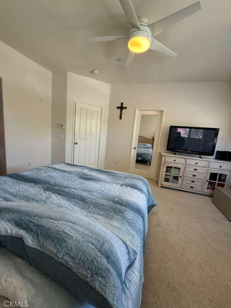 2931 Esperanza Way, Unit B Simi Valley, CA 93063 - Photo 33 of 49 a bedroom with a bed and a tv