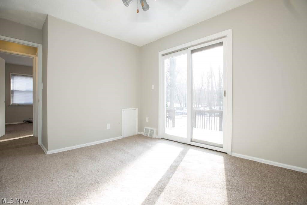 4580 East Berwald Road Cleveland, OH 44121 - Photo 5 of 34 Dining area with sliders to back deck