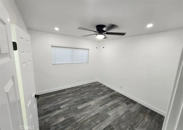 a view of a small space with a hardwood floor