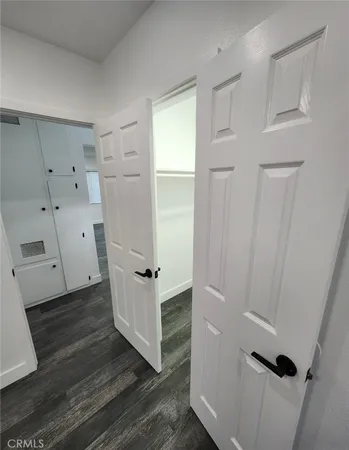 a view of a storage & utility room with a sink