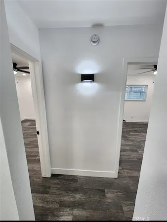 a view of a hallway view with staircase