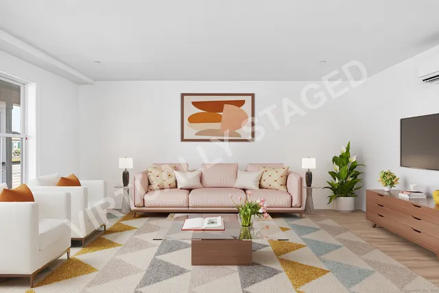 a living room with furniture and a rug