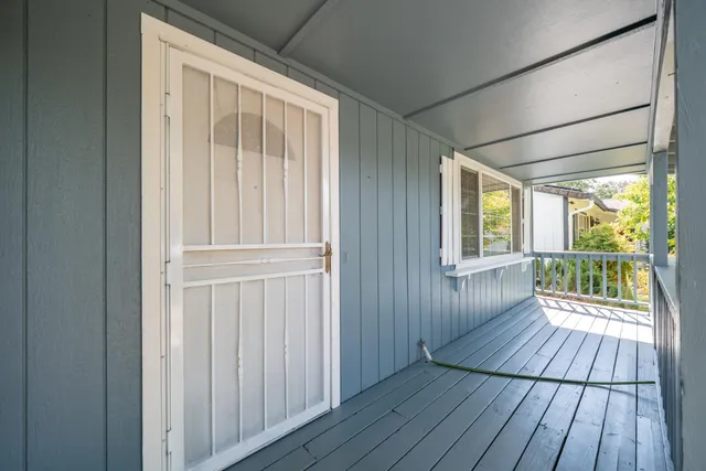 a view of wooden floor in an empty room