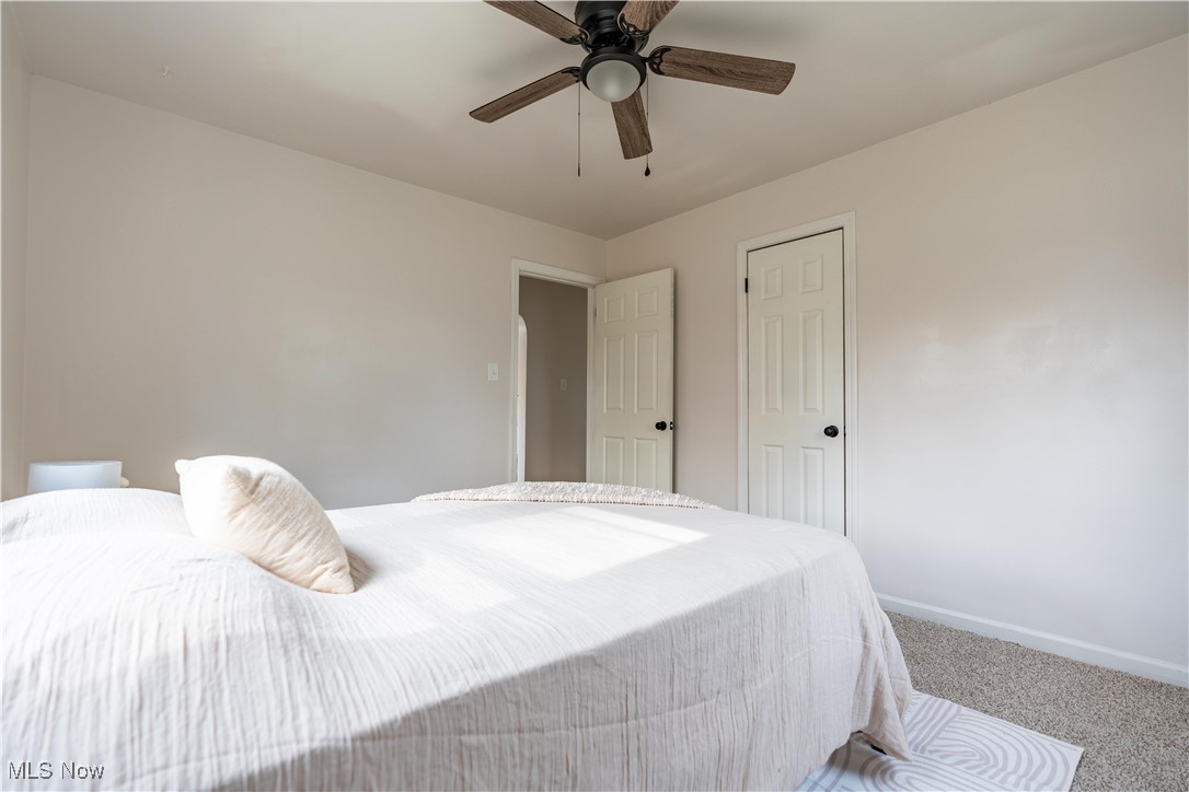 1931 Bridger Road Akron, OH 44312 - Photo 25 of 40 Carpeted bedroom featuring ceiling fan