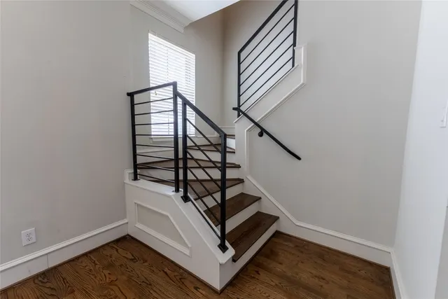 a view of entryway with wooden floor