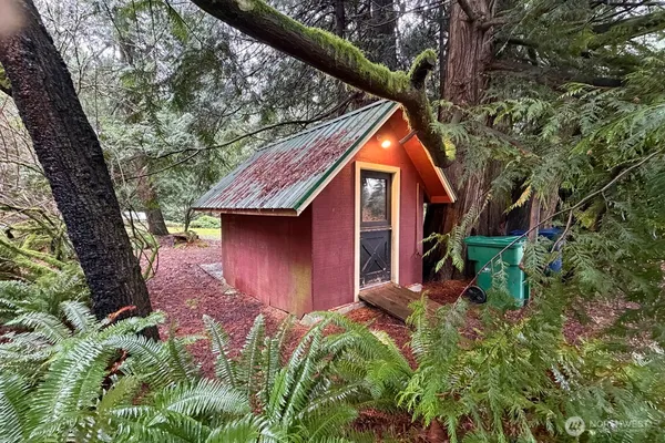 a backyard of a house with lots of green space