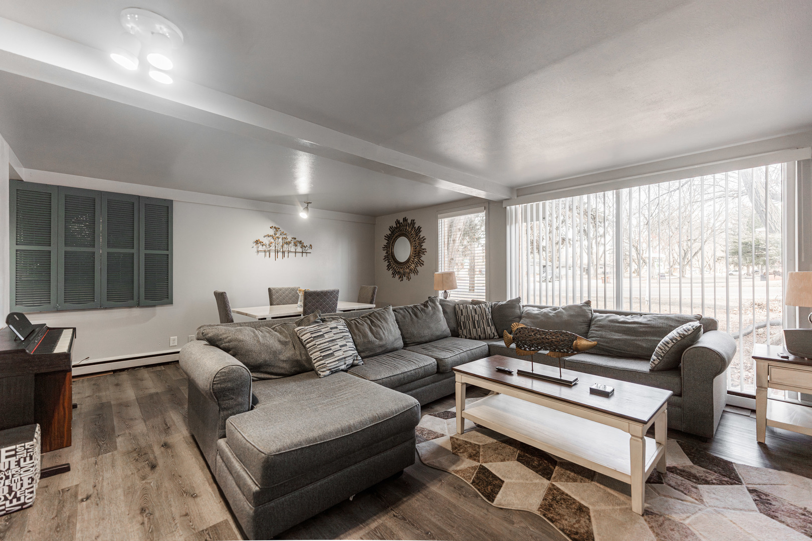 3432 Huffman Boulevard Rockford, IL 61103 - Photo 12 of 32 a living room with furniture and a large window