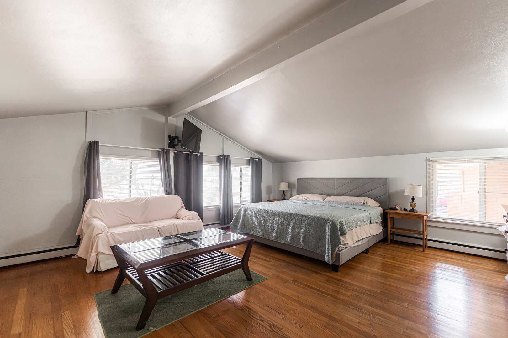 3432 Huffman Boulevard Rockford, IL 61103 - Photo 23 of 32 a bedroom with a bed and a couch