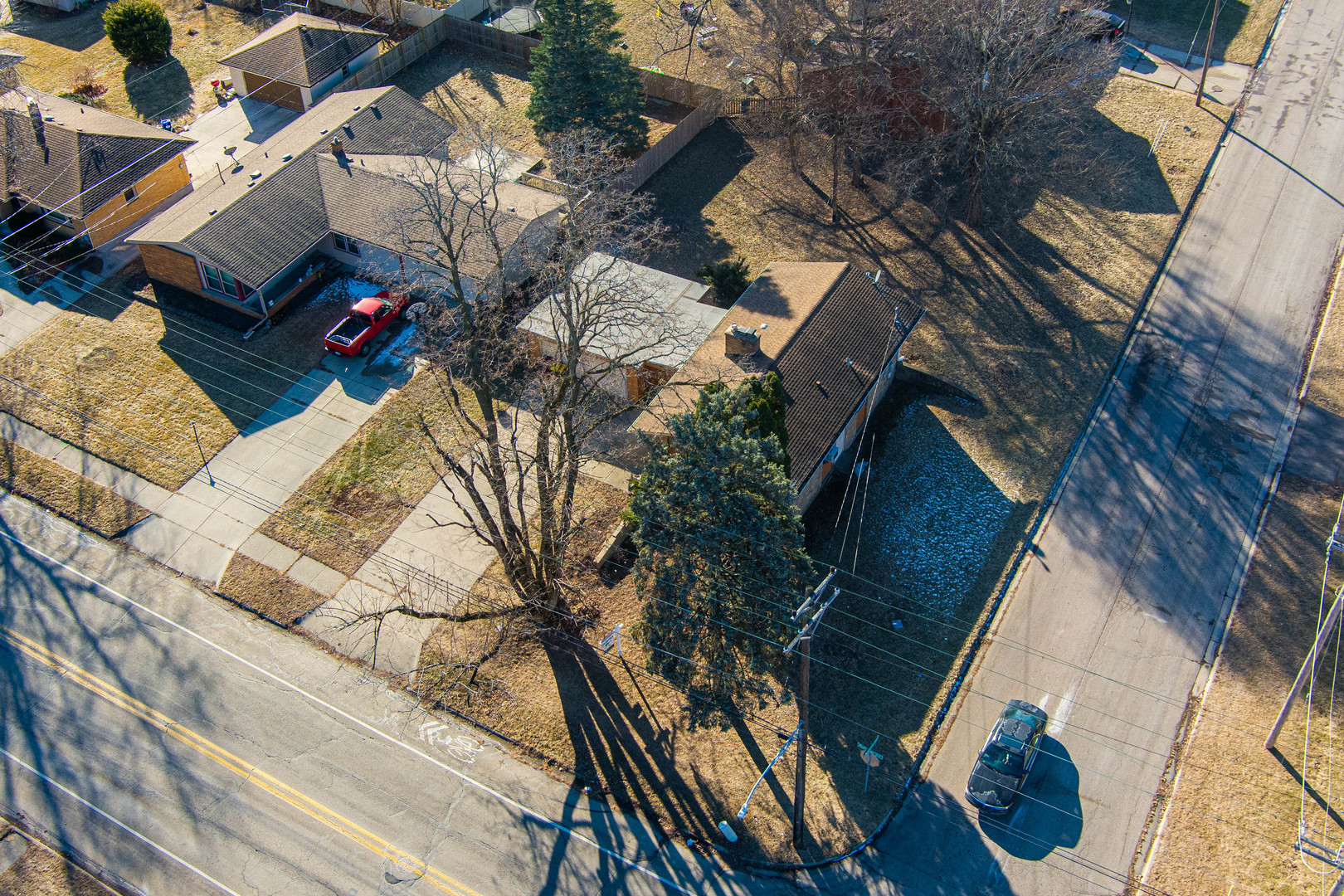 3432 Huffman Boulevard Rockford, IL 61103 - Photo 3 of 32 a view of a house with a snow