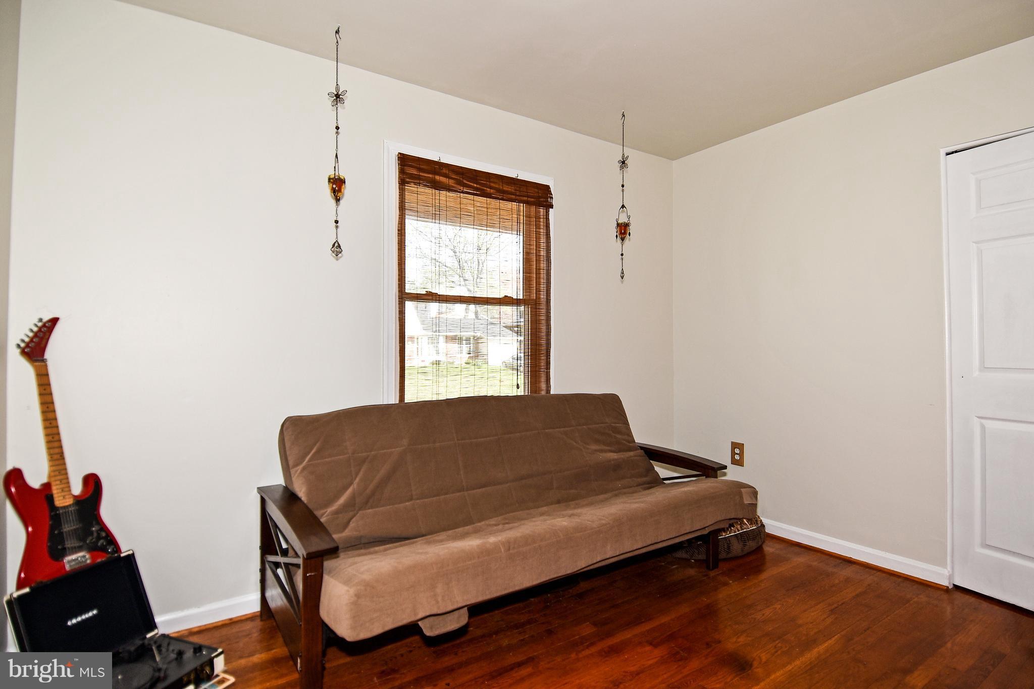 12917 Sturbridge Road Woodbridge, VA 22192 - Photo 13 of 29 Bedroom #3 with hardwood floors.