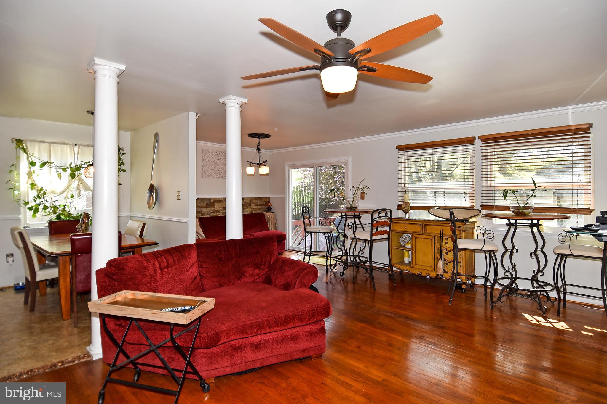 12917 Sturbridge Road Woodbridge, VA 22192 - Photo 4 of 29 View of the family room, dining room, and kitchen.
