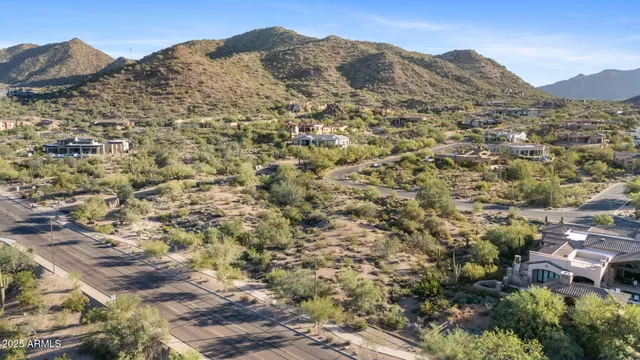a view of a city with mountains in the background