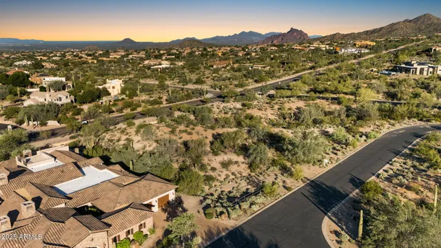 a view of a large body of water with a mountain