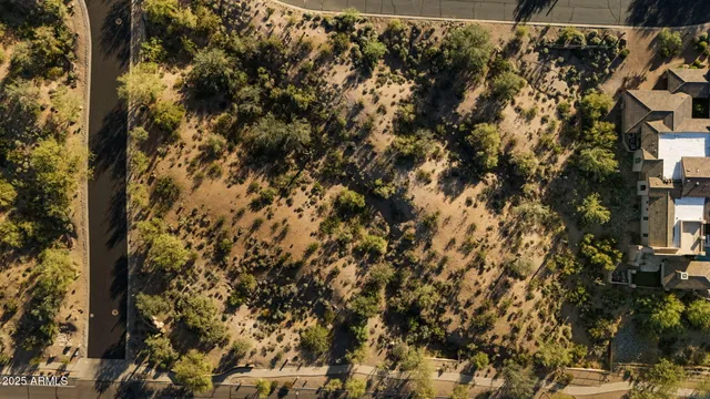 a view of a mountain range in a cloudy sky