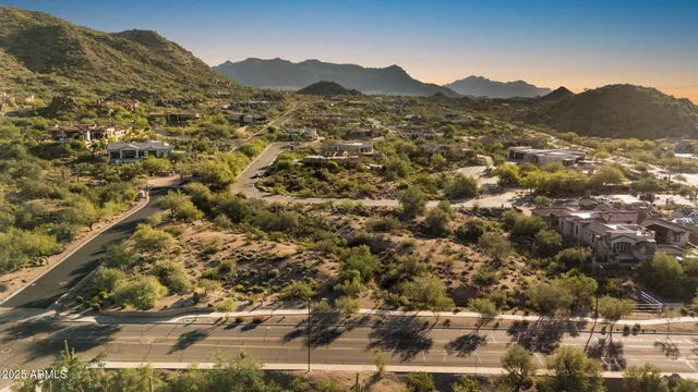 an aerial view of residential house with parking space