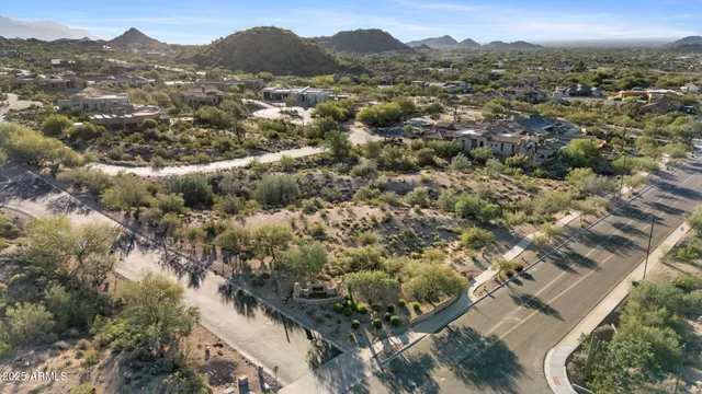 an aerial view of residential house with parking space