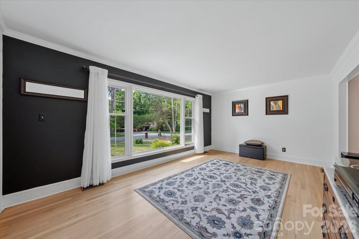 6701 Ronda Avenue Charlotte, NC 28211 - Photo 12 of 46 a bedroom with a bed and a window