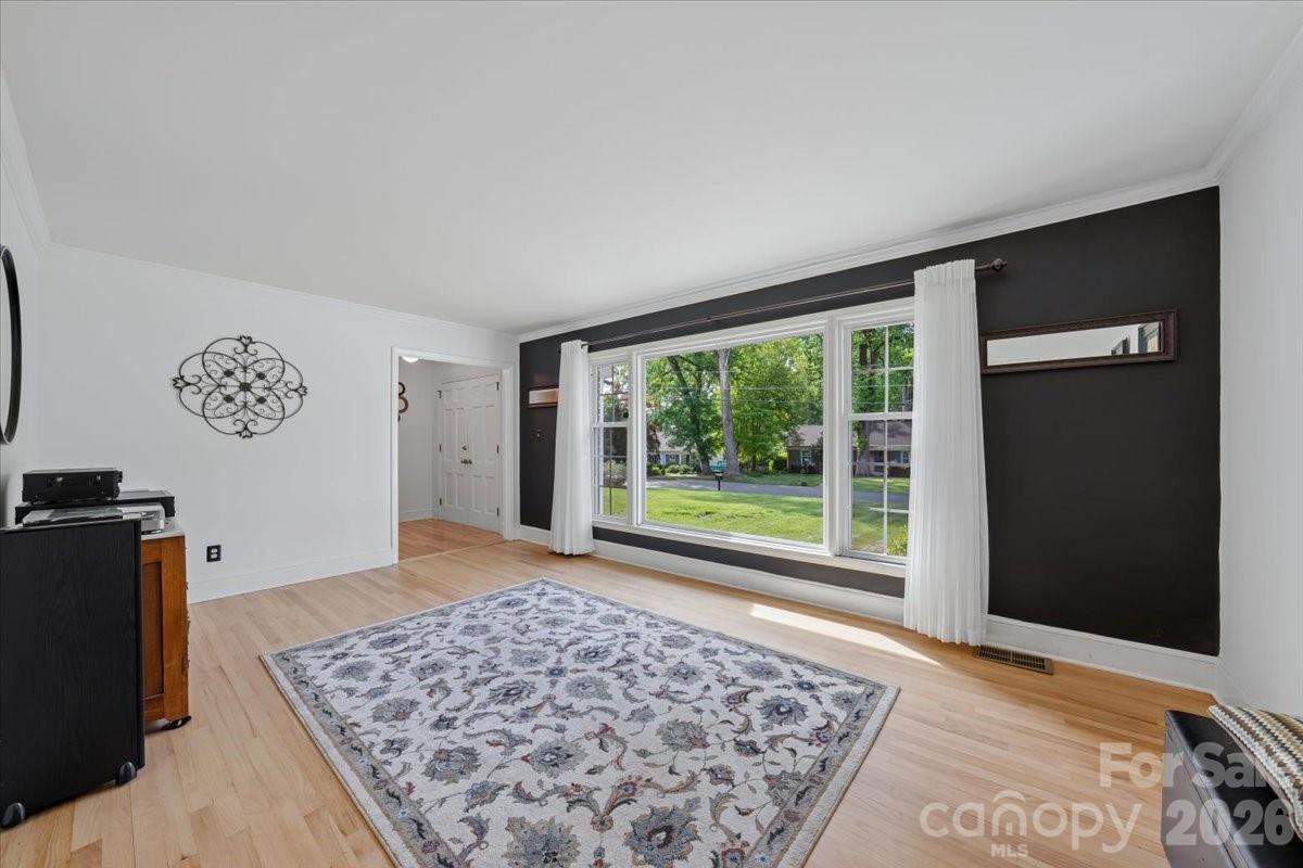 6701 Ronda Avenue Charlotte, NC 28211 - Photo 13 of 46 a view of an empty room with a window