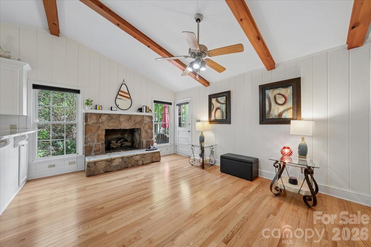 6701 Ronda Avenue Charlotte, NC 28211 - Photo 19 of 46 a living room with furniture and a fireplace