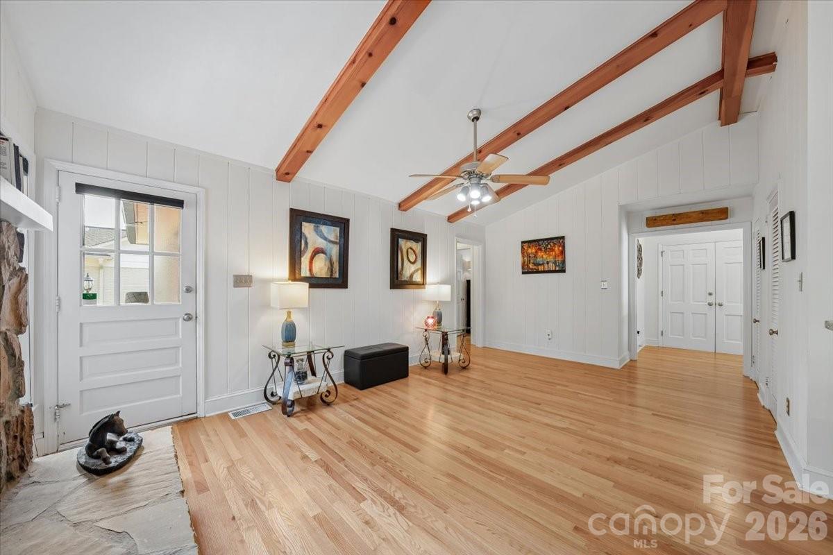 6701 Ronda Avenue Charlotte, NC 28211 - Photo 20 of 46 a bedroom with a bed and wooden floor