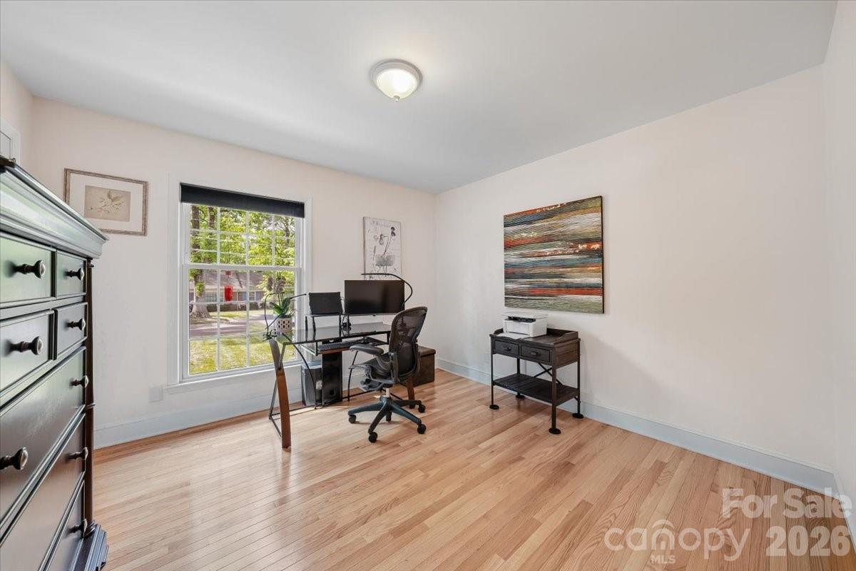 6701 Ronda Avenue Charlotte, NC 28211 - Photo 28 of 46 a view of a workspace with furniture and a window