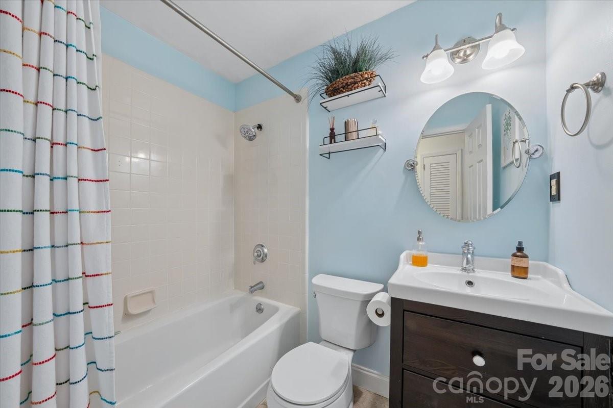 6701 Ronda Avenue Charlotte, NC 28211 - Photo 29 of 46 a bathroom with a sink toilet and shower