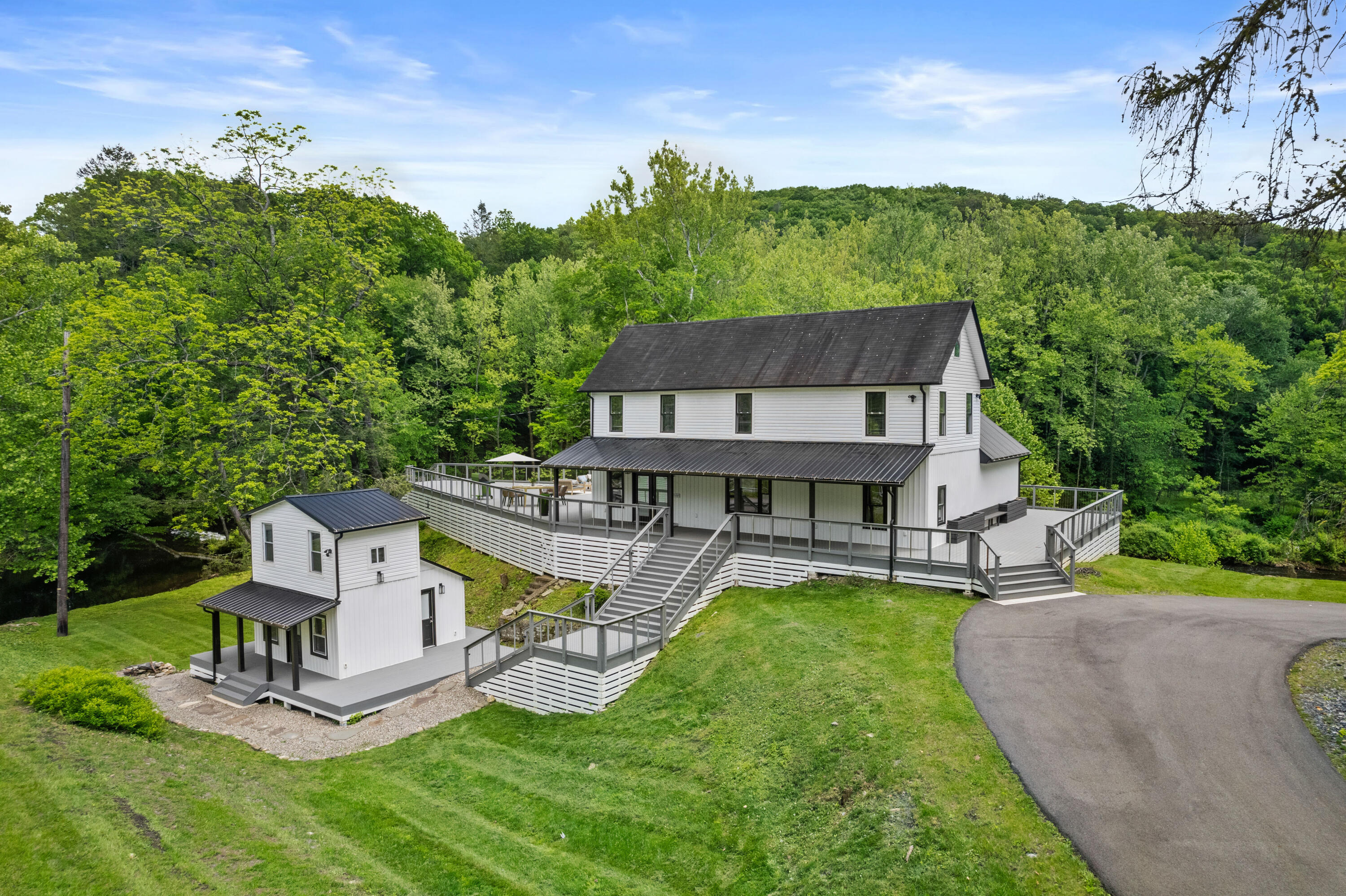 1104 Buttermilk Falls Road East Stroudsburg, PA 18301 - Photo 1 of 73 an aerial view of a house