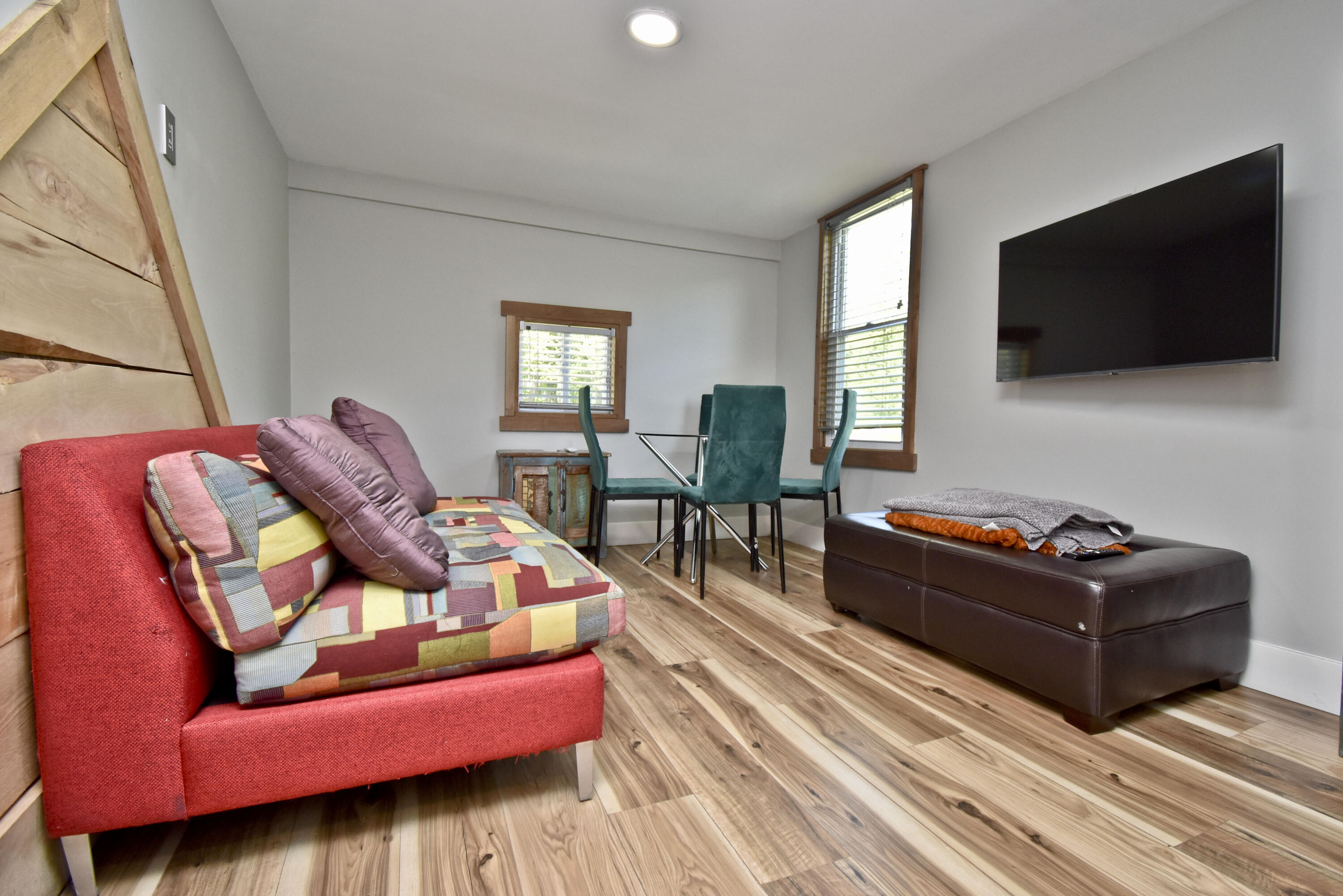 1104 Buttermilk Falls Road East Stroudsburg, PA 18301 - Photo 45 of 73 a living room with furniture and a flat screen tv