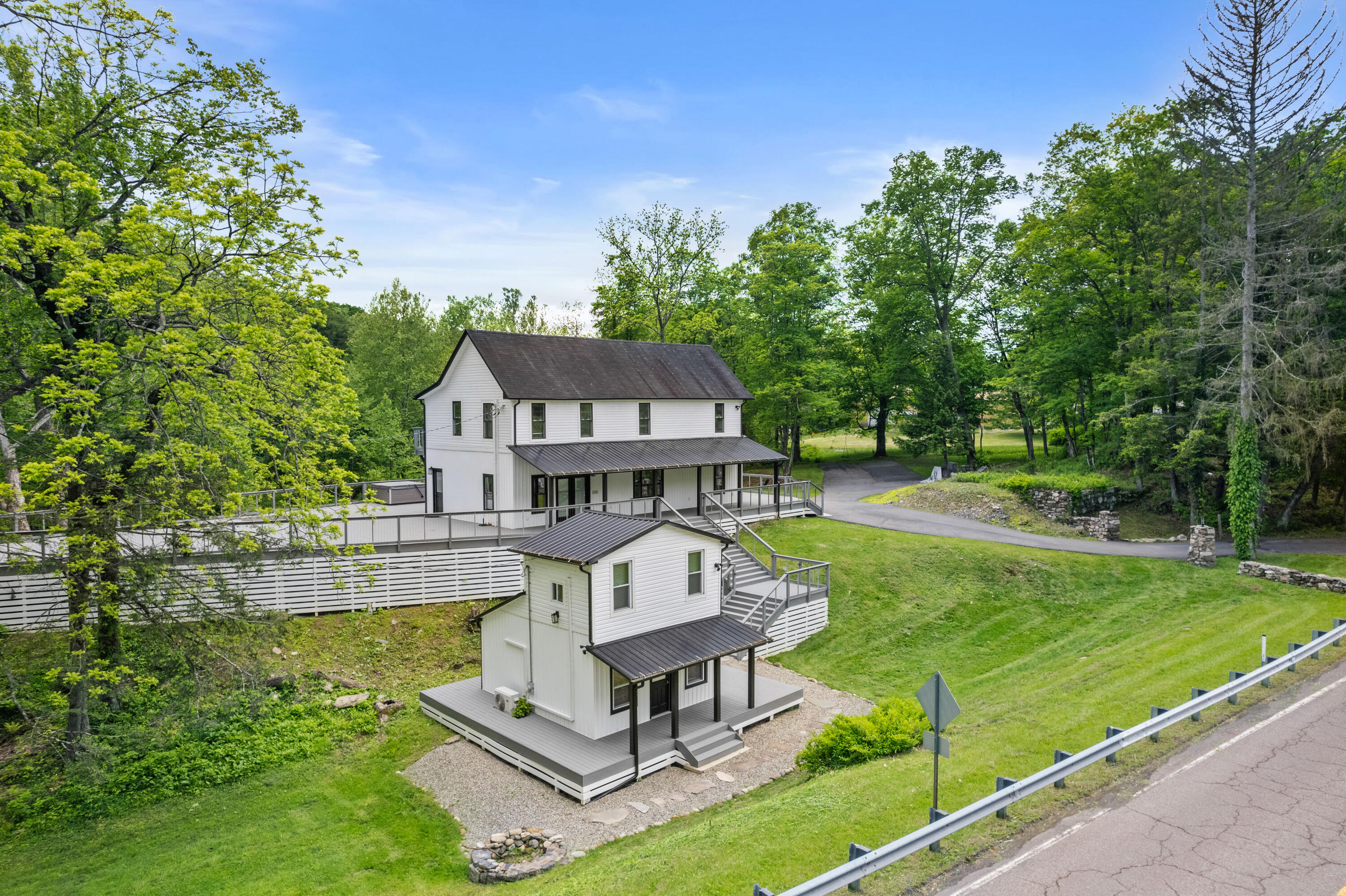 1104 Buttermilk Falls Road East Stroudsburg, PA 18301 - Photo 67 of 73 an aerial view of a house with a big yard