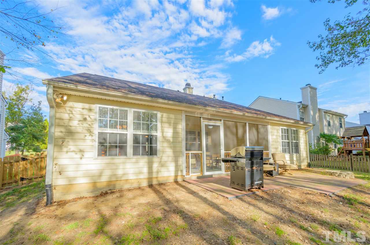 4520 Drewbridge Way Raleigh, NC 27604 - Photo 20 of 22 a view of a building with wooden floor and fence