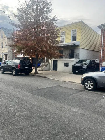 a view of a cars parked in garage