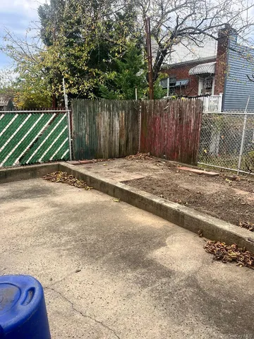 a view of a backyard of a house