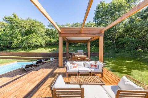 a view of swimming pool with a patio