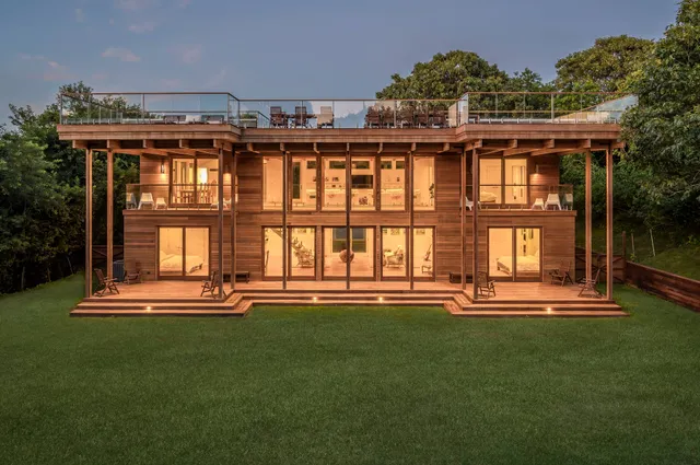 a front view of building with a yard