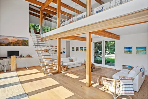 a view of a patio with a table and chairs