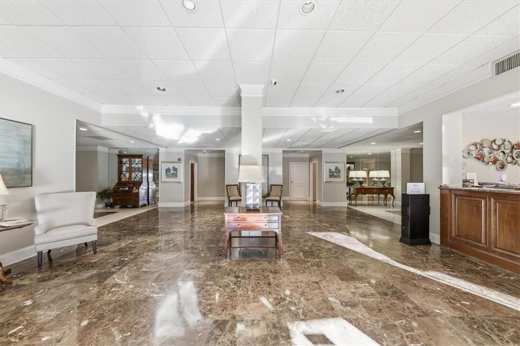 3530 Piedmont Road Northeast, Unit F2 Atlanta, GA 30305 - Photo 39 of 50 a living room with furniture
