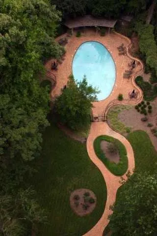 an aerial view of a swimming pool