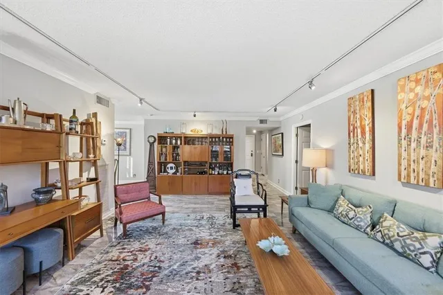 a living room with furniture and a couch