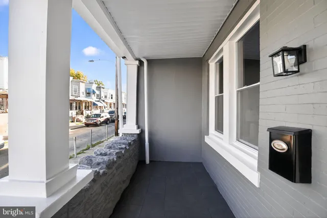a view of a brick building with many windows