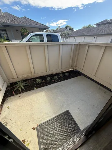 a view of a back yard of the house