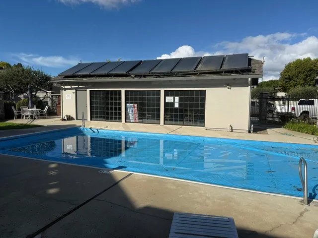 a view of a house with a swimming pool