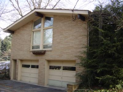 5905 Old Carriage Road Bath, PA 18014 - Photo 6 of 6 a front view of a house with garage