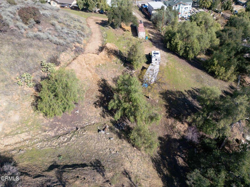 5946 Oak Knolls Road Simi Valley, CA 93063 - Photo 11 of 18 a view of a yard with plants and trees