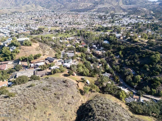 a view of a city with mountains in the background