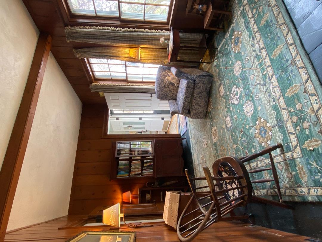 70 Spring Street Vineyard Haven, MA 02568 - Photo 17 of 68 a living room with furniture and a rug