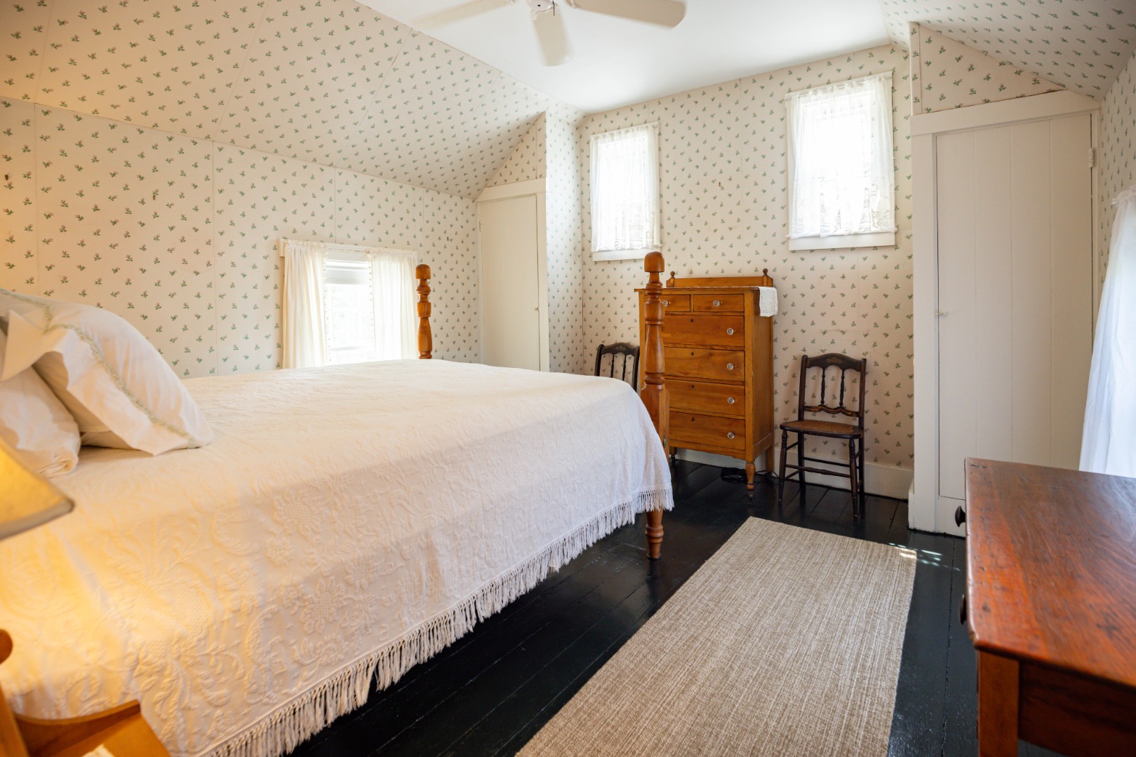 70 Spring Street Vineyard Haven, MA 02568 - Photo 55 of 68 a bedroom with bed and wooden floor